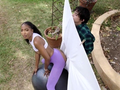 Black yoga milf lost in lust for young white cock outside