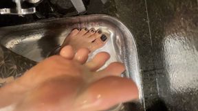 washing sweat in the slave's kitchen sink