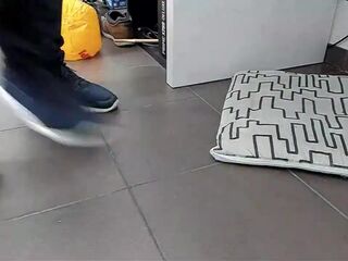 Boy Shoeplay with beach ball in Underneath Armor, Vans Slide Ons, Ebony Socks