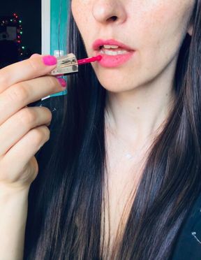 Application of liquid hot pink lipstick 🩷