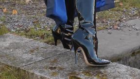 Sexy blonde lady blue leather and shiny boots