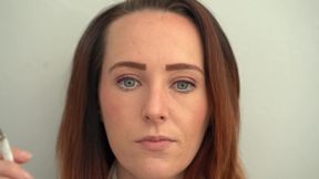Extreme Close up Blue Eyed Redhead Smoking