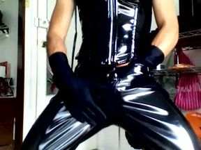 Masked Sissy Boy in Orange Stockings and Corset Cums in Its Heels