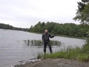 horny silicone masked exhibitionist has quick cum in lake
