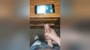 Young Male mastubating to his own porn video