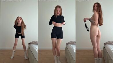 Ginger cutie strips down yoga shorts to flash hairy pussy and big natural tits