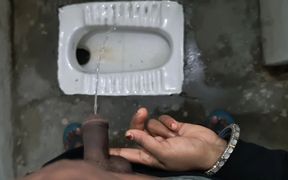 Desi Bhabhi Holding Stepbrother-in-law's Penis and Making Him Pee and Peeing Herself