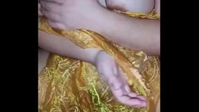 Tattooed Asian MILF films herself fingering her big booty and fat ass