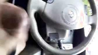 Amateur guy jerks his big cock in the car outdoors