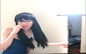 Cute asian crossdresser cums on rubber cock