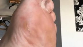 Bare feet slow and slightly dirty