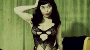 Huge tits Asian pinup in stockings strips in old movie