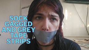 Sock gagged and grey tape strips moaning till remove with wet hair