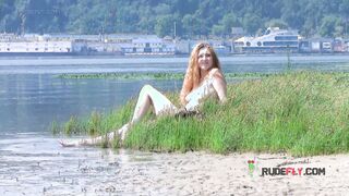 Playful blond nudist teen