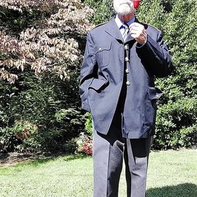 Officer enjoying his pipe and sunny afternoon