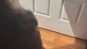Pissing in the trash can with the front door open