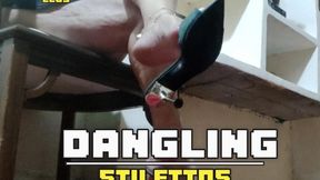 Mature woman with legs and feet covered in oil leaving dangling stiletto heels (1)