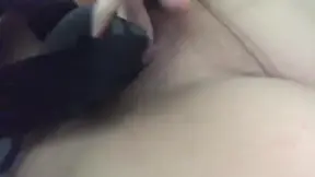 Young Latina HOT MOM plays with her snug drenched snatch using a giant black dildo.