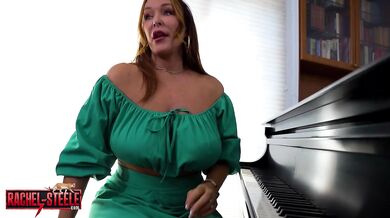 Redhead piano teacher Rachel Steele finger fucks herself in silky stockings while alone