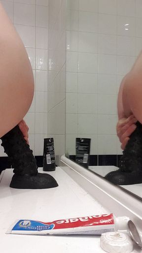 Carl Cagedwarrior Takes Huge BBC Dildo in Hotel Bathroom with Mirror Reflection