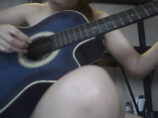 Tiny blond disrobes for her guitar teacher, so that guy can finish on her back