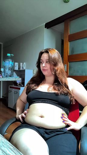 Hot Chubby Woman Filling Her Round Belly with Some Sweets