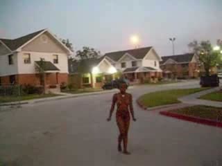 Skanky ghetto whore walks about neighborhood all naked