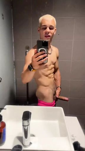 Handsome Blonde Fingering His Dick in the Train Toilet