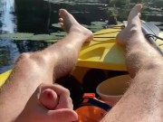 Hairy daddy long legs pumps his tight uncut cock in a kayak