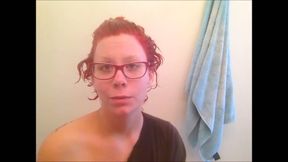 This pink haired four eyed slut likes to shave her pussy in the shower