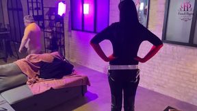 Caged sub chokes on her mistress’s strap-on behind the scenes