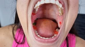 Devouring gummy bears and close-up of giant Asian tongue