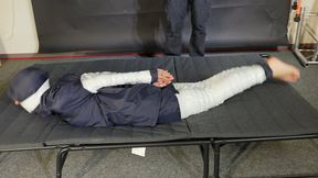 Rachel Adams taped and gagged in shiny nylon Rainwear