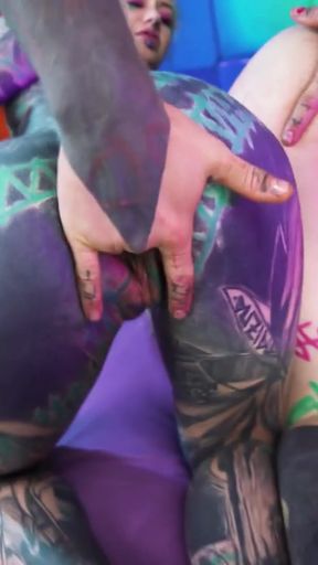 Alternative girl and tattooed girl share two cocks   Clip 1