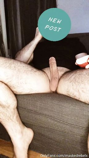 Hairy hunk plays with his fat cock while eating an apple