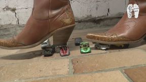 Matchbox Cars under Cowgirl Boots