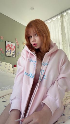 Pink hoodie, red hair