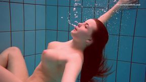 ”Czech girl Vesta enters swimming pool naked”