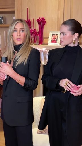 Candid Moment with Jennifer Aniston and a Friend