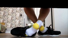 White socks with a yellow heel play with men shoes WMV