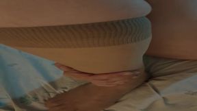 OLDER WOMAN with massive rear and nylon stockings shows her steamy feet