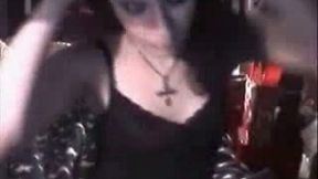 Classy goth beauty exposes her pale skin curves on webcam