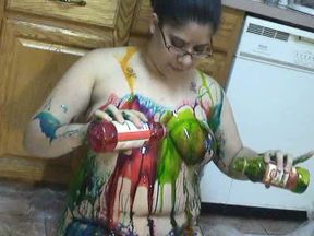 Now thatstupid amateur milfie chick puts paint all over herself