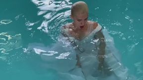 Naughty bride gets wet in the pool