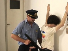 Cuffed delinquent munching on a fat cop meatstick