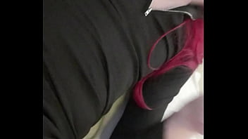 Redheaded trans in tight black dress lifts skirt to show red underwear and big anal plug inside ass fingering and big girldick