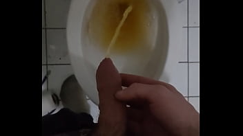 Twink pissing in toilet