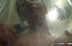 Hairy brunette washes her cunt in the shower —