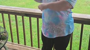 Big-assed MILF performs a sultry striptease in public