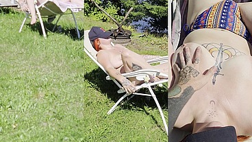 Big tits hot wife caught sunbathing while out camping